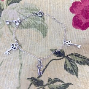 4 Charm custom silver,gold or mixed bracelets. This one is called Life Keys.